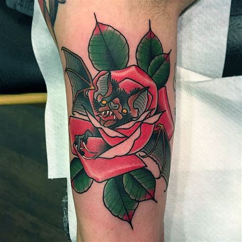 Red rose with green leaves tattoo - Tattoogrid.net