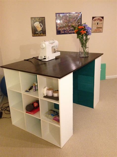 My new craft table. 2 storage cubbies and a stained piece of oak. Super easy and cheap! Thanks ...