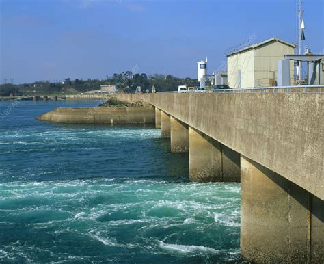 Water entering through tidal barrage - Stock Image - T144/0014 ...