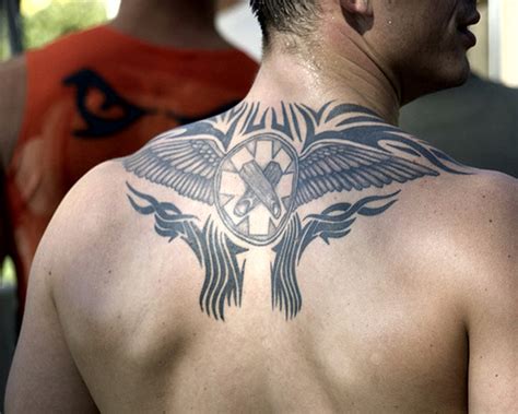 Top 10 Sexiest Tribal Back Tattoos For Men | Mr. RauRauR