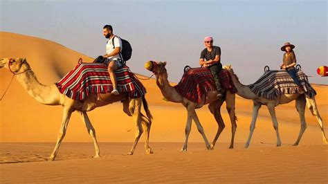 Camel riding at the Abu Dhabi desert - YouTube