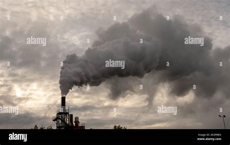 Smoking chimneys of a chemical plant emitting huge amounts of ...