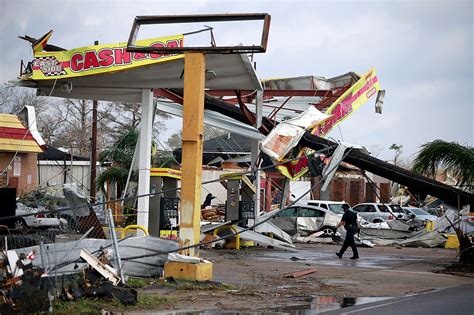 Scenes of devastation after tornado half a mile wide tears through New ...