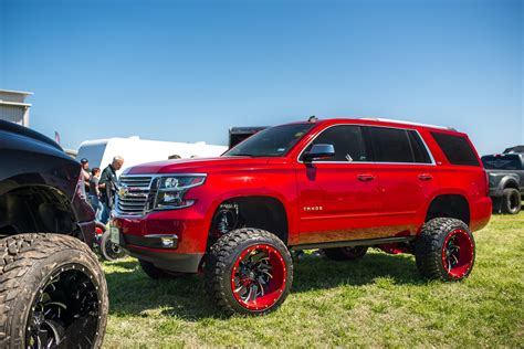 Radical Red Chevy Tahoe on Fuel Rims With Colormatched Lips — CARiD.com ...