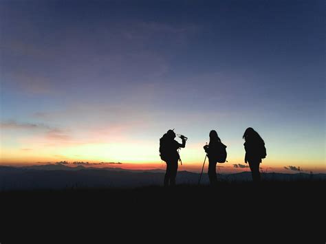 Silhouette of Three People · Free Stock Photo