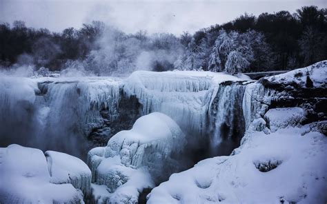 A partially frozen Niagara Falls is seen on American side during sub ...