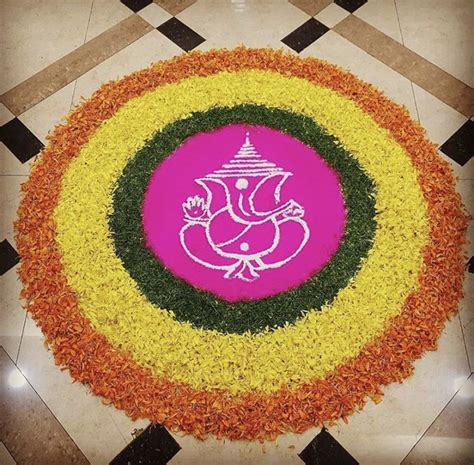 Ganesha Rangoli using flower petals in 2020 | Flower rangoli, Rangoli designs flower, Rangoli ...