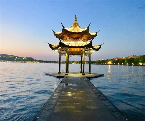 Sunset by the West Lake, Hangzhou, China was really something extraordinary : r/travel