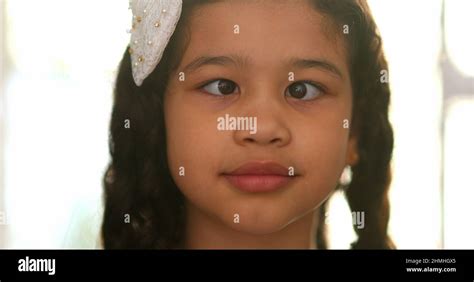 Funny little girl doing crossed eyes Stock Photo - Alamy