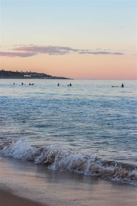 NSW North Guide: Sunset on Manly Beach – GIRL INTRIGUED BY