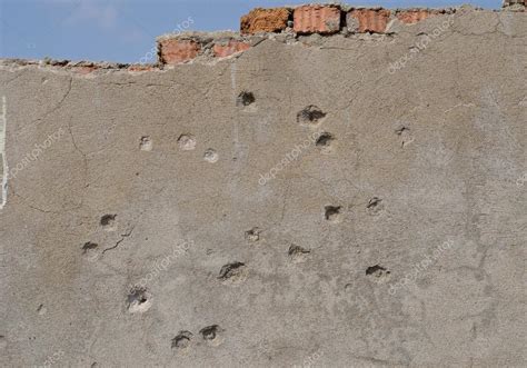 Wall with bullet-holes — Stock Photo © KirsanovVal #13780912