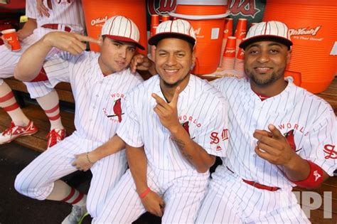 Photo: St. Louis Cardinals wear throwback uniforms - SLP2016082705 - UPI.com