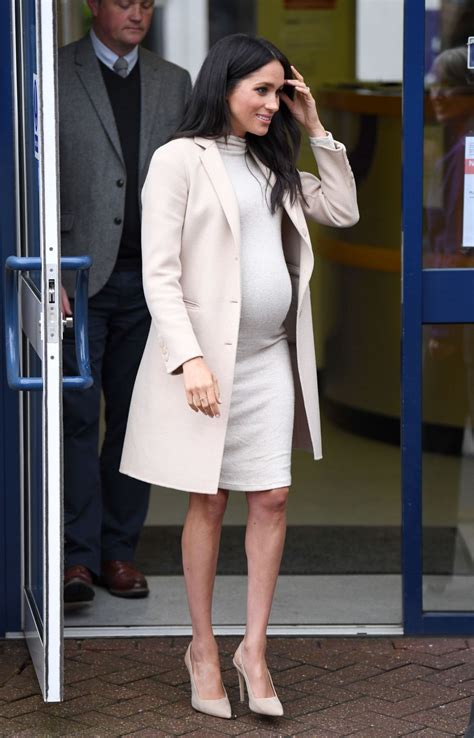 Pregnant MEGHAN MARKLE at Mayhew Animal Welfare Charity in London 01/16 ...