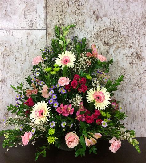 Designers Choice Feminine Colors Traditional Sympathy Arrangement in ...