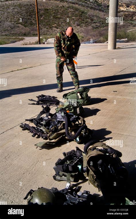 FBI SWAT (Special Weapons and Tactics) team member dons specialized ...