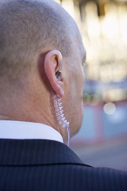 250+ Bodyguard Ear Piece Stock Photos, Pictures & Royalty-Free Images ...