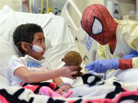 See Superheroes Surprise Sick Kids in Hospital - ABC News