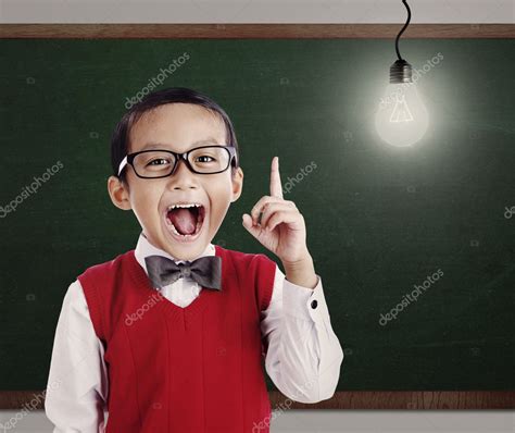 Elementary School Student with Bright idea Stock Photo by ©realinemedia ...