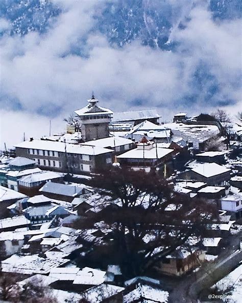 Snowfall at a Himalayan village - Kalpa in Himachal. This picturesque village with pine forests ...