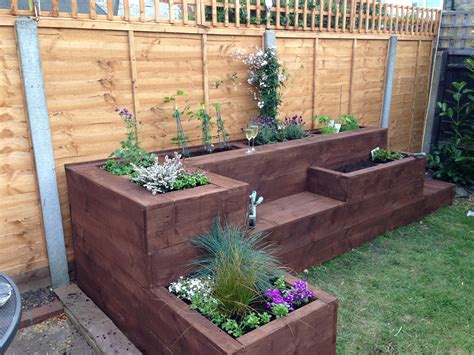 Raised flower bed | Diy raised garden, Pallets garden, Outdoor garden decor