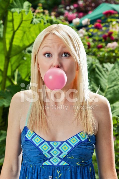 Young Woman Blowing Bubble Gum Stock Photo | Royalty-Free | FreeImages