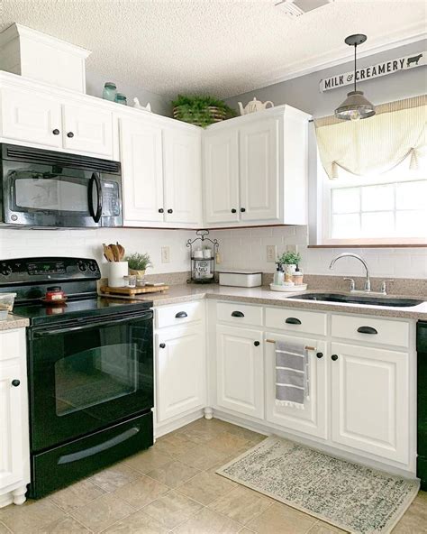 9 White Kitchens with Black Appliances for a Bold Splash of Contrast