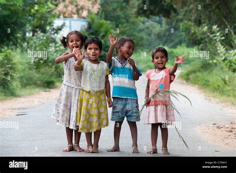 Happy young rural Indian village children standing on a road laughing Stock Photo: 39300829 - Alamy