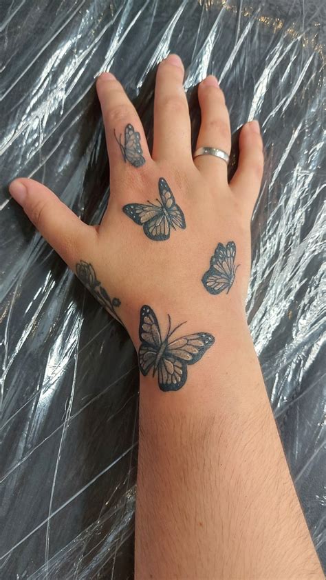 Details more than 78 butterfly tattoo hand best - in.cdgdbentre