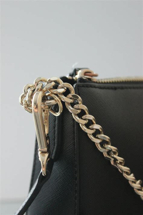 A Black Bag with Gold Chain · Free Stock Photo