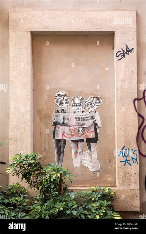 Cut-to-shape street art poster in Trastevere district of Rome, Italy Stock Photo - Alamy