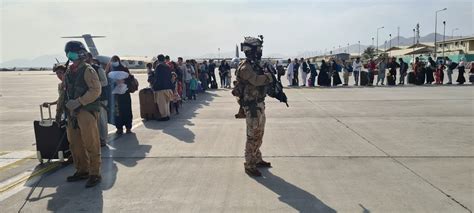 Deadly firefight erupts at Kabul airport as evacuation chaos continues ...