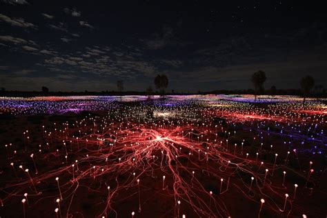 Over 50,000 LED light bulbs illuminate the Australian outback in artist Bruce Munro’s art ...