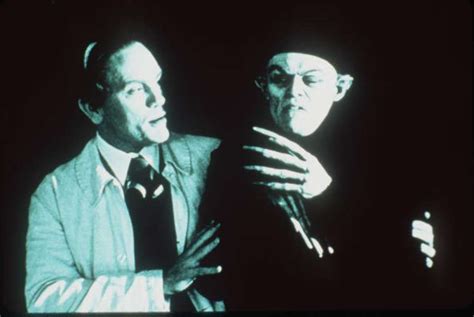 Nosferatu director F.W. Murnau (John Malkovich, left, with Dafoe ...