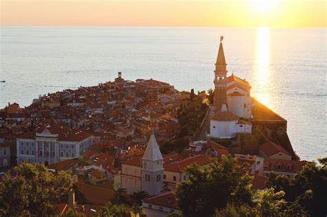 Premium Photo | Historical center of old town piran. the sunset sky and ...