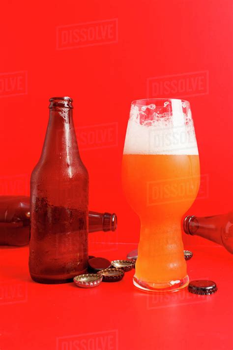 IPA beer glass and various bottles - Stock Photo - Dissolve