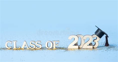 Graduated 2023 Concept. Wooden Numbers 2023 with Graduate Cap on Dark Background with Tinsel ...