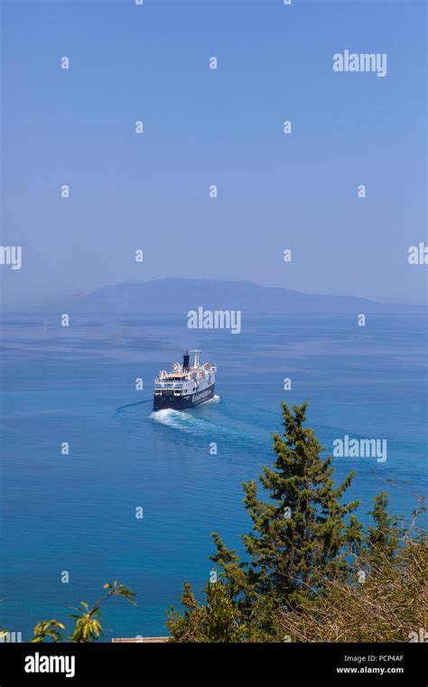 A large ferry leaves Poros Kefalonia Stock Photo - Alamy