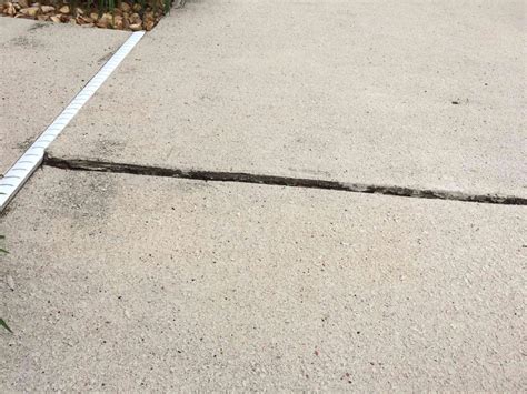 Concrete Leveling - Slab Repair with PolyLyft in Apison, TN - Uneven Surface