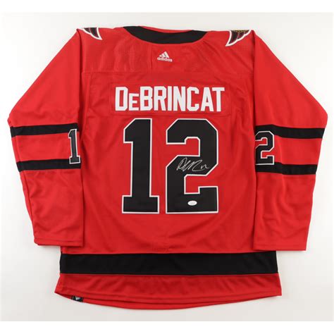 Alex DeBrincat Signed Jersey (JSA) | Pristine Auction