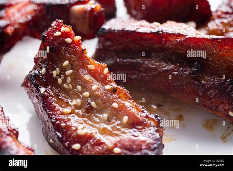 German style pork ribs on white plate Stock Photo - Alamy