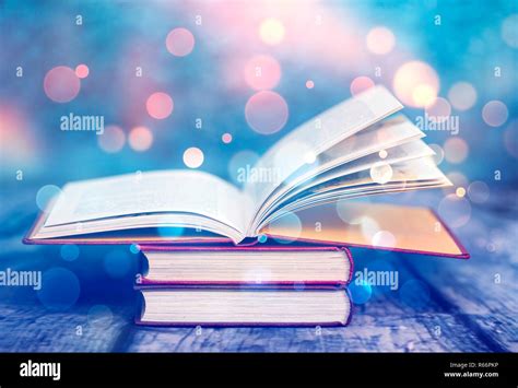 Vintage open book Stock Photo - Alamy