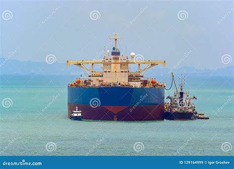 Loading Anchored Oil Supertanker Via a Ship-to-ship Oil Transfer Stock Image - Image of carrier ...