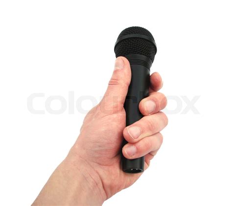 Hand with microphone | Stock image | Colourbox