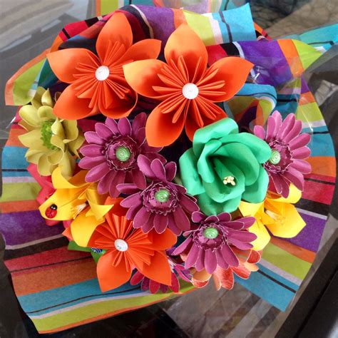 a bouquet of colorful flowers sitting on top of a table