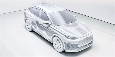 AUDI Q6 e-tron projects driving information on front windshield using ...