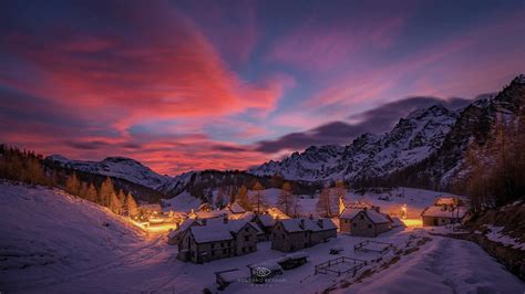 Download Light Night Village House Snow Mountain Photography Winter HD Wallpaper by Rossano Ferrari