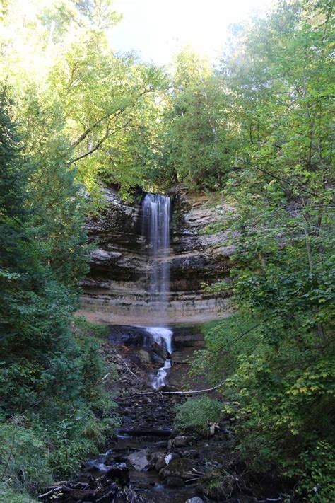 Munising Falls - A Waterfall By A Pictured Rocks Base Town