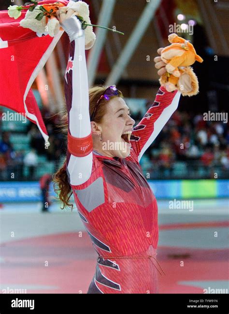 Clara Hughes of Canada wins gold in the women's 5000m speed skating at ...