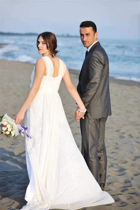 romantic beach wedding at sunset 12644771 Stock Photo at Vecteezy