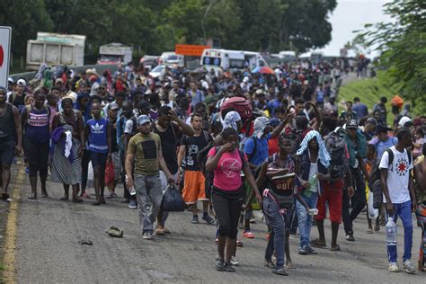 Hundreds of migrants corralled at detention center in Mexico | Inquirer ...